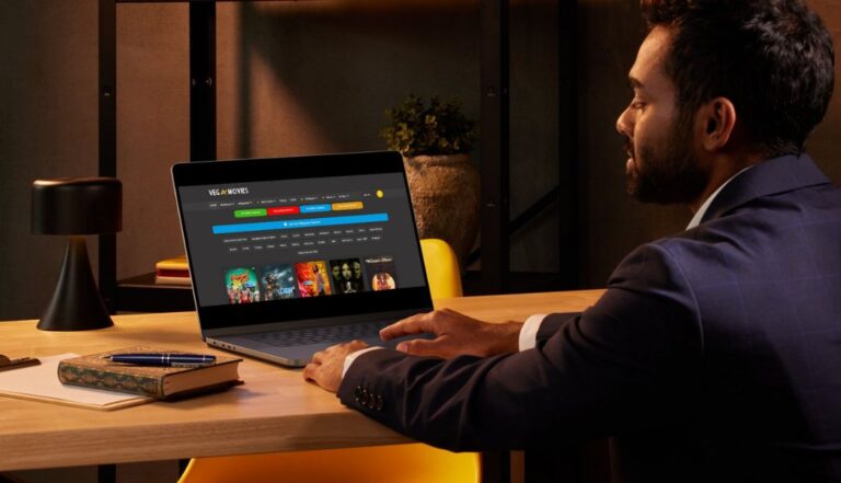 using vegamovies website on laptop